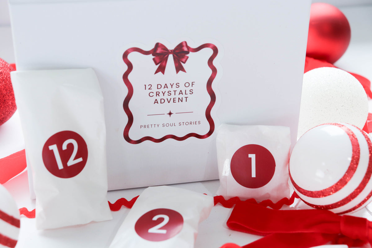 12 Days of Crystals Advent 2026 box with numbered wrapped crystals