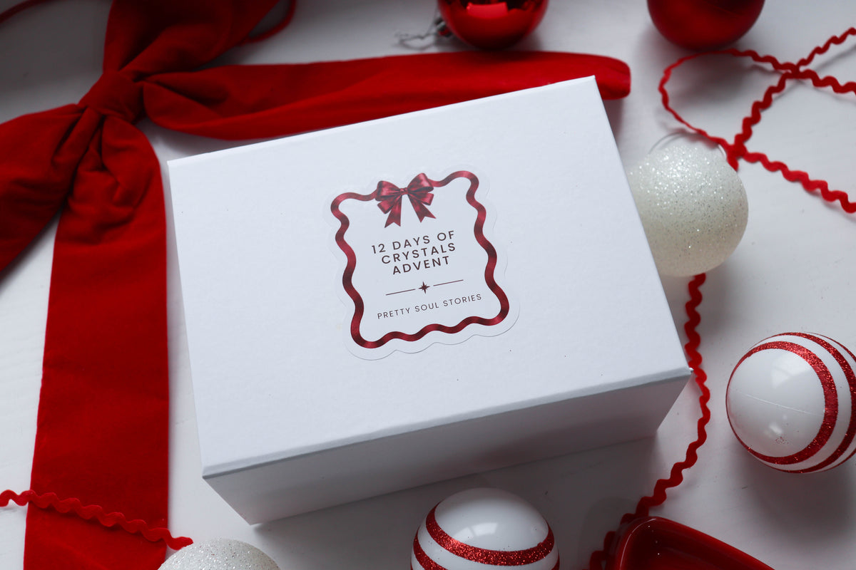 12 Days of Crystals Advent box with red ribbon