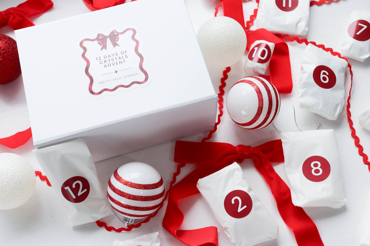 Advent box surrounded by numbered crystal parcels